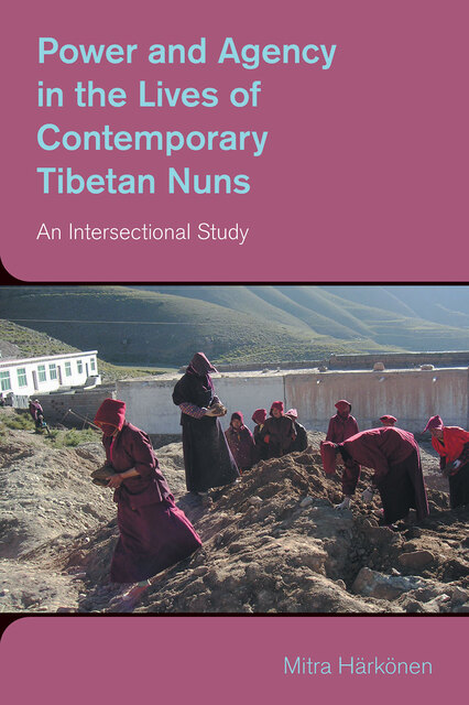 nuns removing stones and rocks from patch of land on mountainside 