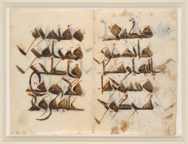 Two-page spread of an 11th-century (CE) North African Qur'an written in a form of the 'new style kufic' script on parchment.