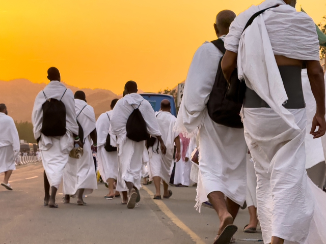 monks in robes walking 