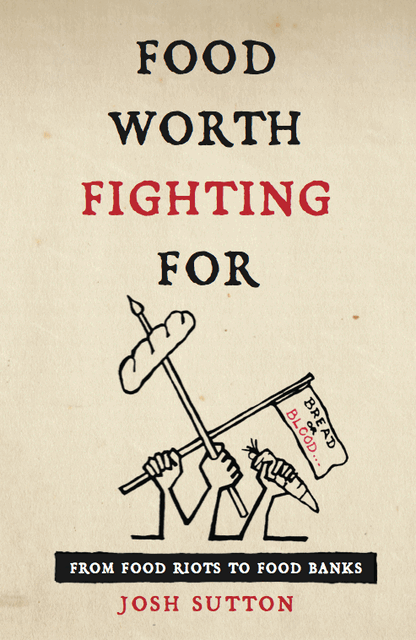 arms hold placards with slogans and a pole piercing a loaf of bread