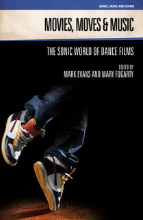 photo of the legs of a breakdancer in blue jeans and sneakers
