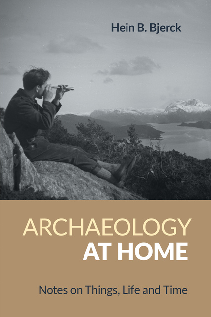 photo of author's father  in the 1950s sitting on a rocky hillside above a fjord and looking through a telescope 