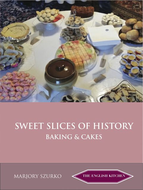 colour photo of various cakes and biscuits on a table