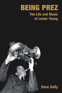 photo of Lester Young playing sax and holding instrument over his head