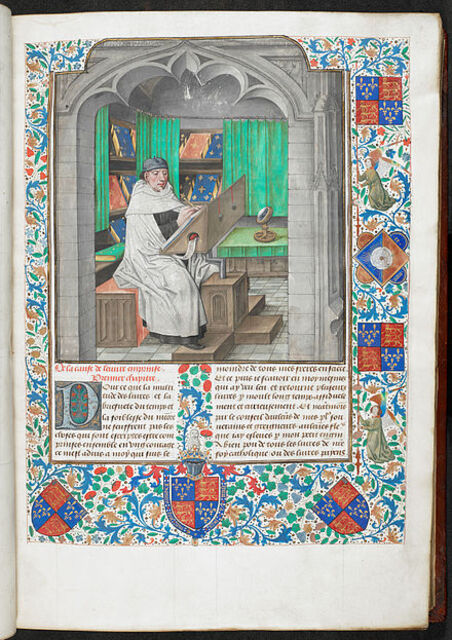 15th-century miniature painting showing Vincent of Beauvais writing in a library. 