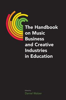 graphic image using part of a multicoloured vinyl recordrecord next to book title