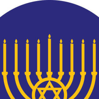 illustration of menorah with lit candles against a blue background